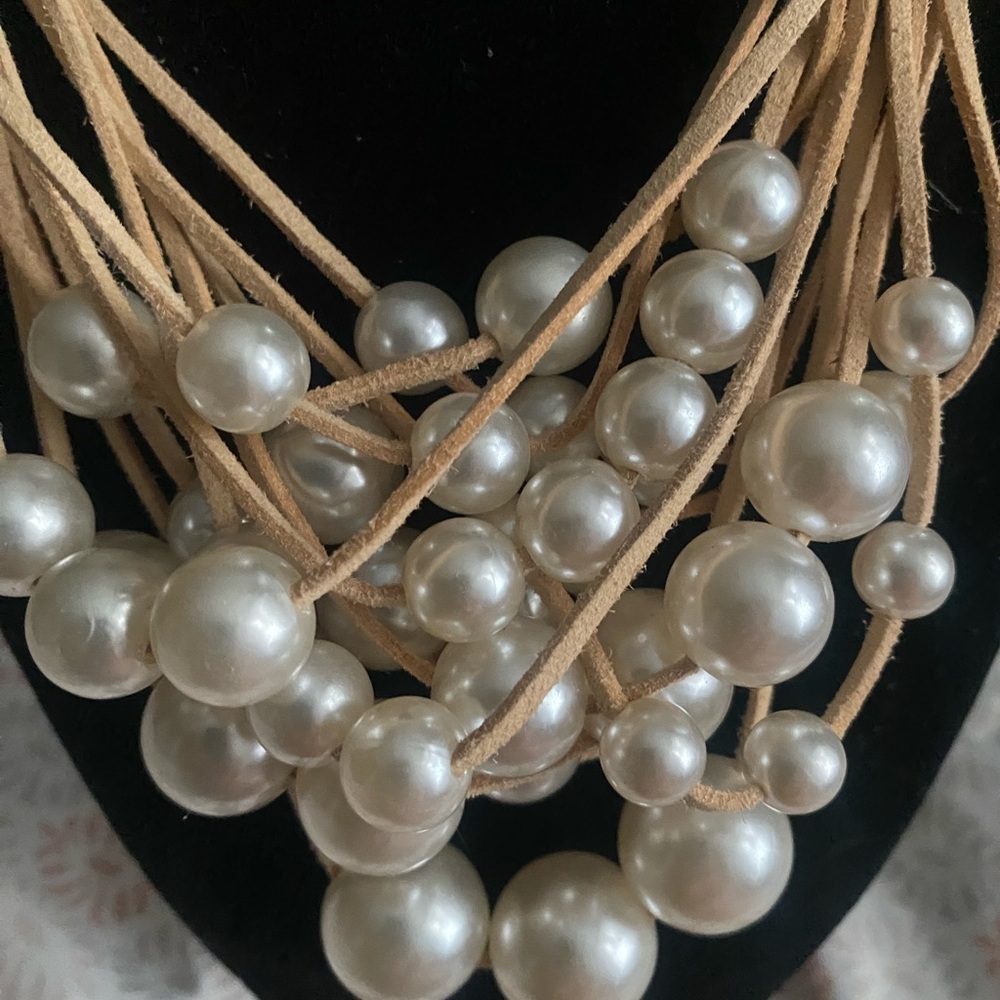 Pearls on a leather strand